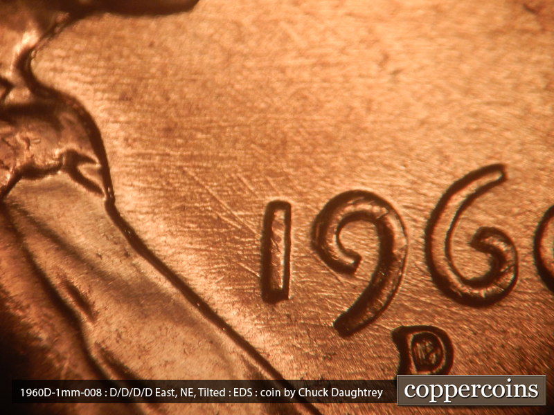 Die-stage A marker on 1960D•1MM•008 showing Multidirectional die scratches through 19 in date.