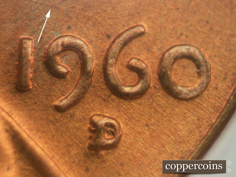 Die-stage B marker on 1960D•1MM•009 showing ESE die scratch above 19 in date.