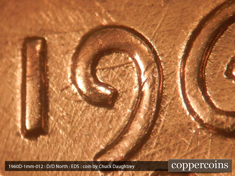 Die-stage A marker on 1960D•1MM•012 showing Die scratches through date.