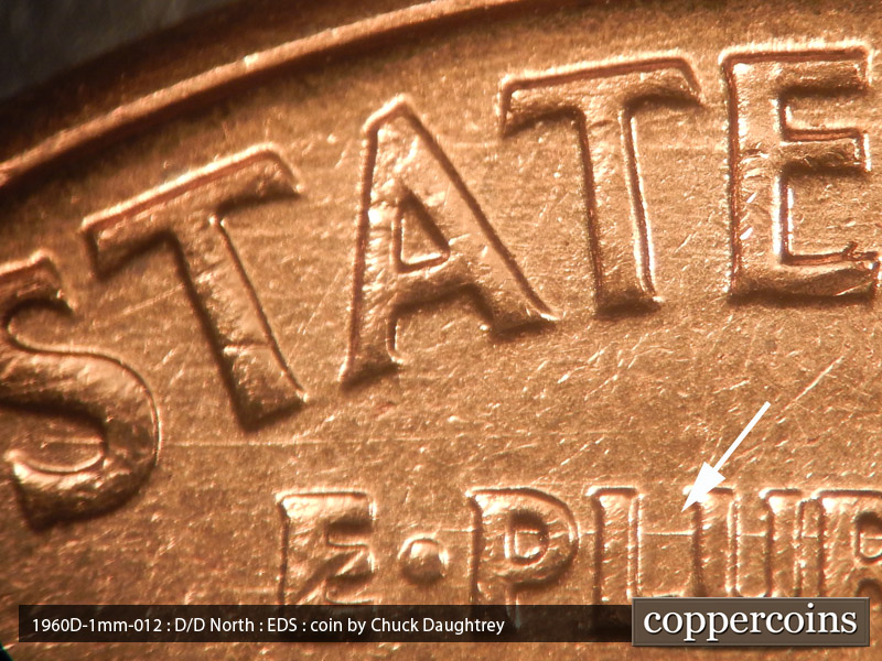 Die-stage A marker on 1960D•1MM•012 showing Die scratches through STATES and E PLURIBUS UNUM.