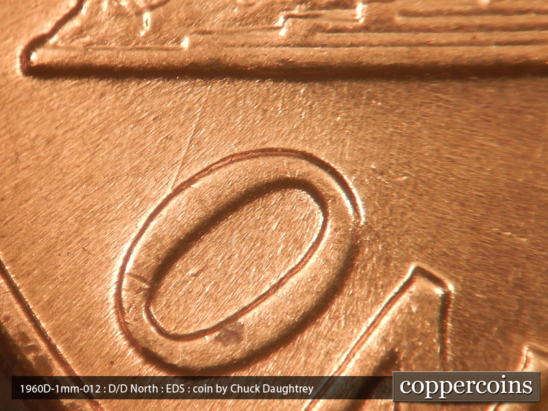 Die-stage A marker on 1960D•1MM•012 showing SSW sie scratch from base to O in ONE.