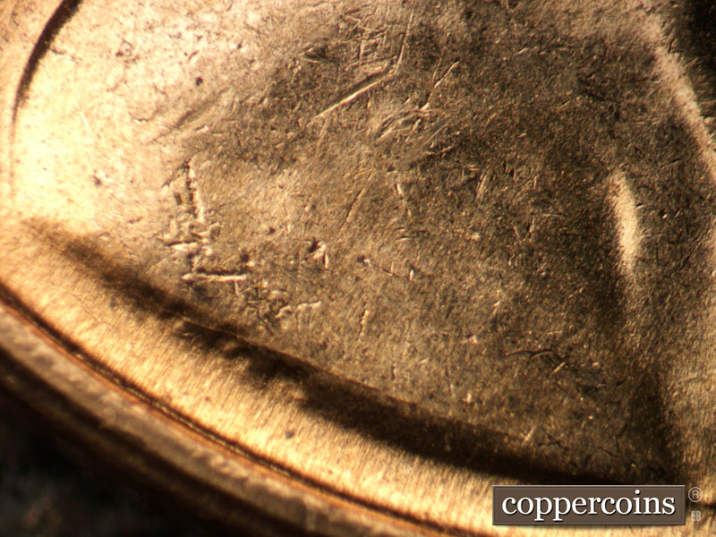 Die-stage B marker on 1960D•1MM•013 showing Die crack above VDB.