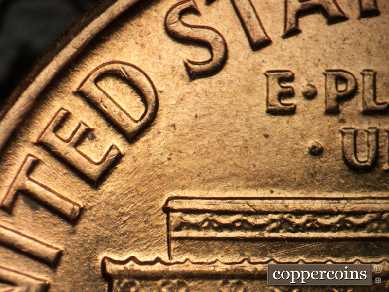 Die-stage B marker on 1960D•1MM•013 showing Pair of NE die scratches from O in ONE to base.