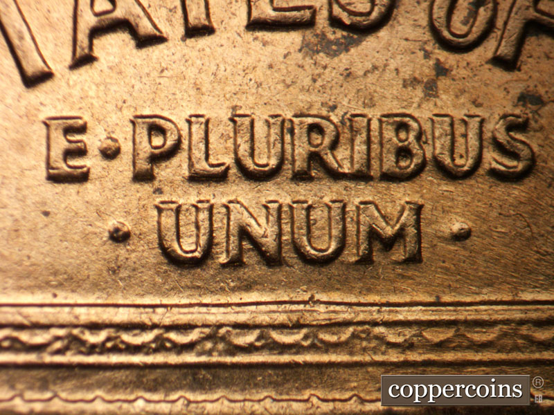 Die-stage B marker on 1960D•1MM•013 showing ENE die scratches through UNUM.