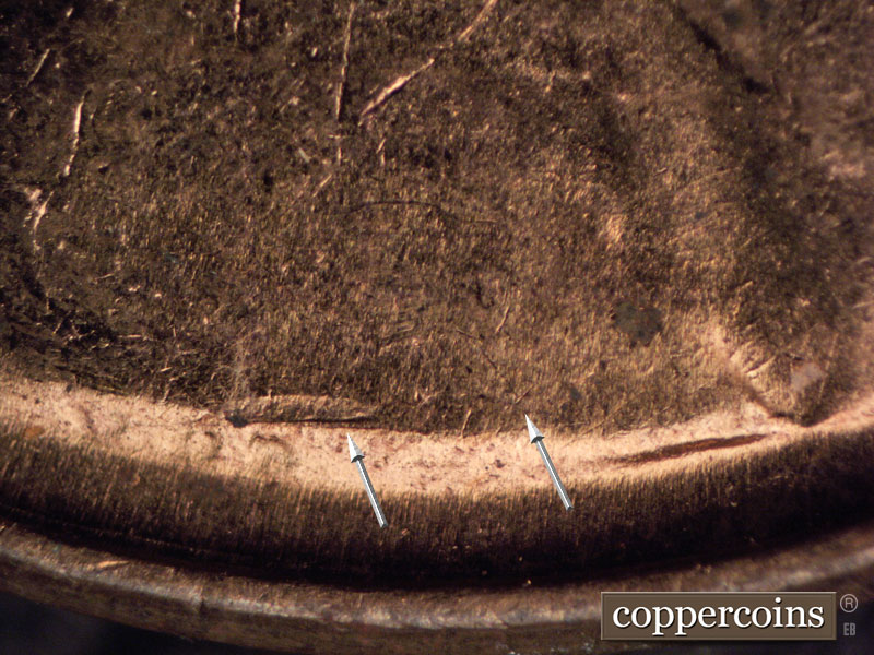 Die-stage C marker on 1960D•1MM•013 showing Die crack above VDB.