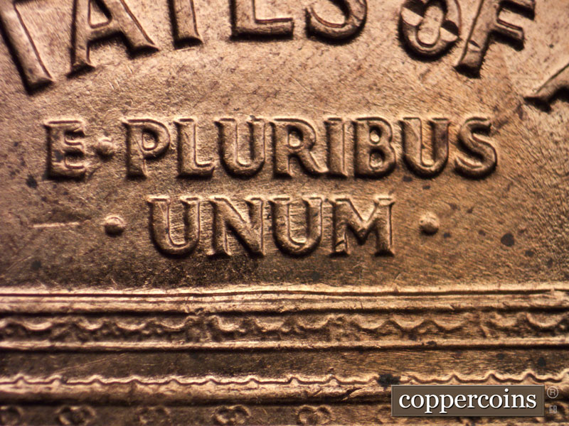 Die-stage C marker on 1960D•1MM•013 showing ENE die scratches through UNUM.