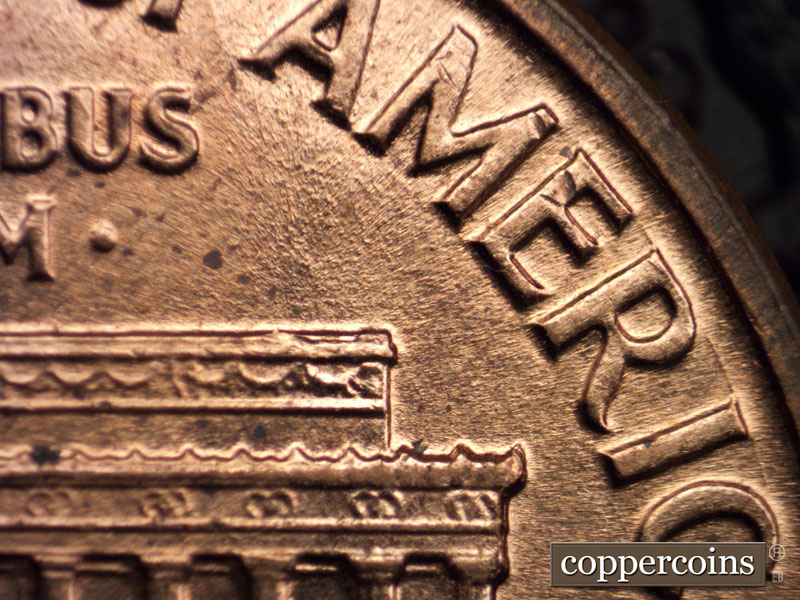 Die-stage C marker on 1960D•1MM•013 showing Short SE die scratch from first A in AMERICA.