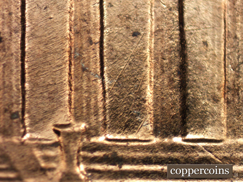 Die-stage A marker on 1960D•1MM•015 showing NE die scratch in bay 10.