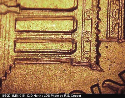 Die-stage C marker on 1960D•1MM•015 showing Light die scratch in the 10th bay.