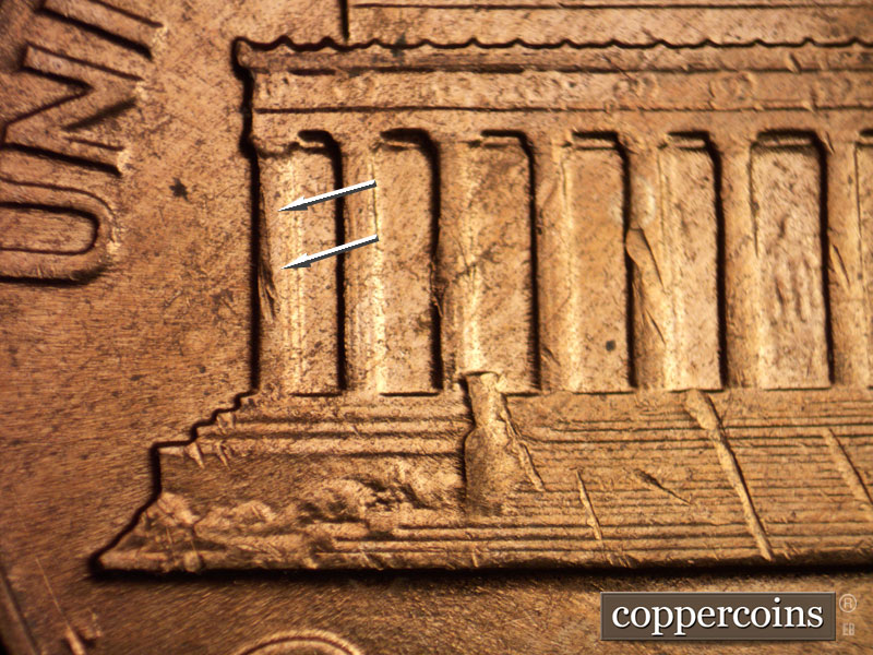 Die-stage C marker on 1960D•1MM•016 showing Die crack on column 1.