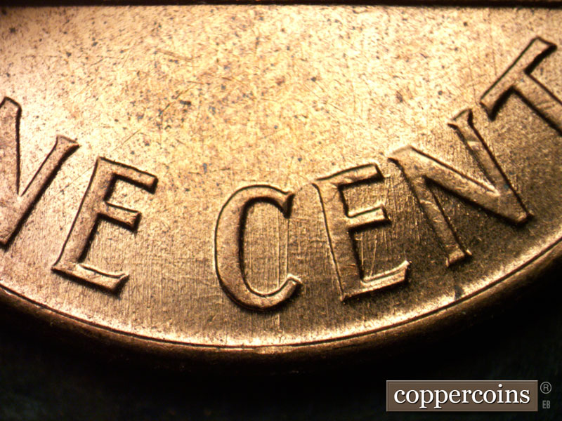 Die-stage A marker on 1960D•1MM•017 showing Heavy N/S die scratches through C in CENT.