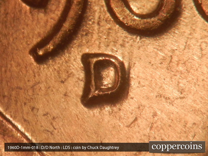Die-stage C marker on 1960D•1MM•018 showing Closeup of repunched mintmark, Worn N/S die scratch between (^ in date.