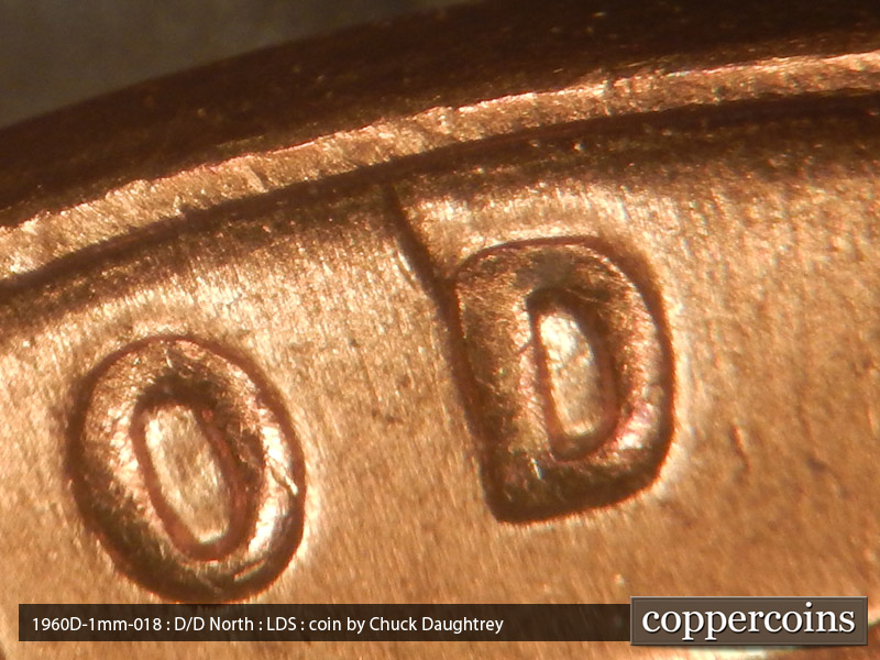Die-stage C marker on 1960D•1MM•018 showing Die dent NW on D of GOD.