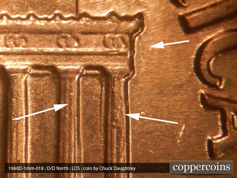 Die-stage C marker on 1960D•1MM•018 showing A large die break runs down the 12th column. A light die crack at the top of column 11.