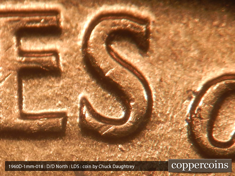 Die-stage C marker on 1960D•1MM•018 showing A die dot below the S in States.