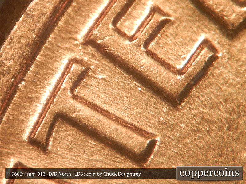 Die-stage C marker on 1960D•1MM•018 showing Die dots between upper TE in UNITED.
