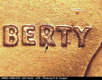 Die-stage C marker on 1960D•1MM•019 showing Die chip in R of LIBERTY,.