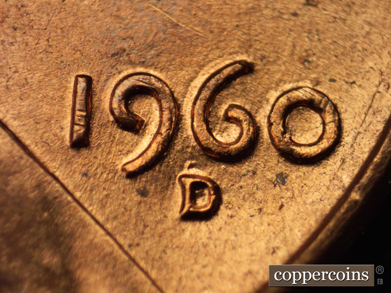 Die-stage B marker on 1960D•1MM•020 showing NNE die scratches through date.