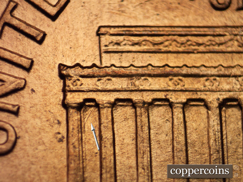 Die-stage B marker on 1960D•1MM•020 showing Die scratches on upper first Bay.