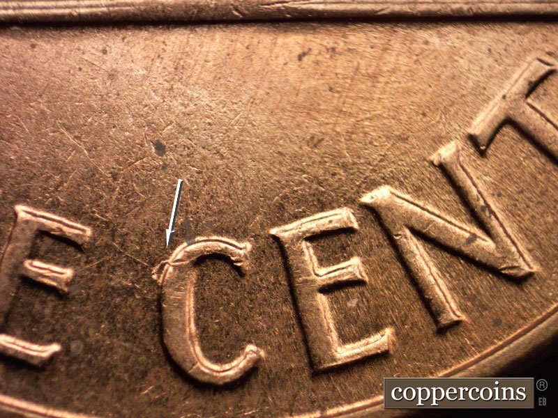 Die-stage C marker on 1960D•1MM•020 showing Large die crack on C in CENT.