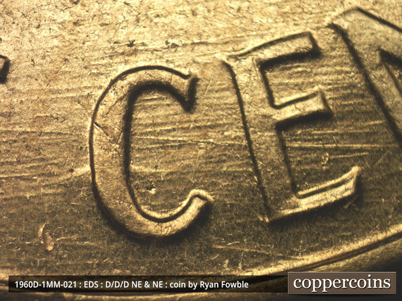 Die-stage A marker on 1960D•1MM•021 showing Generally E/W die scratches through CENT.