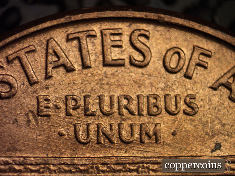Die-stage B marker on 1960D•1MM•021 showing ESE die scratched through E PLURIBUS UNUM.