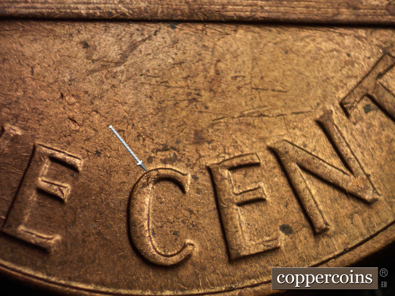 Die-stage B marker on 1960D•1MM•021 showing A small die break shows in C of CENT.