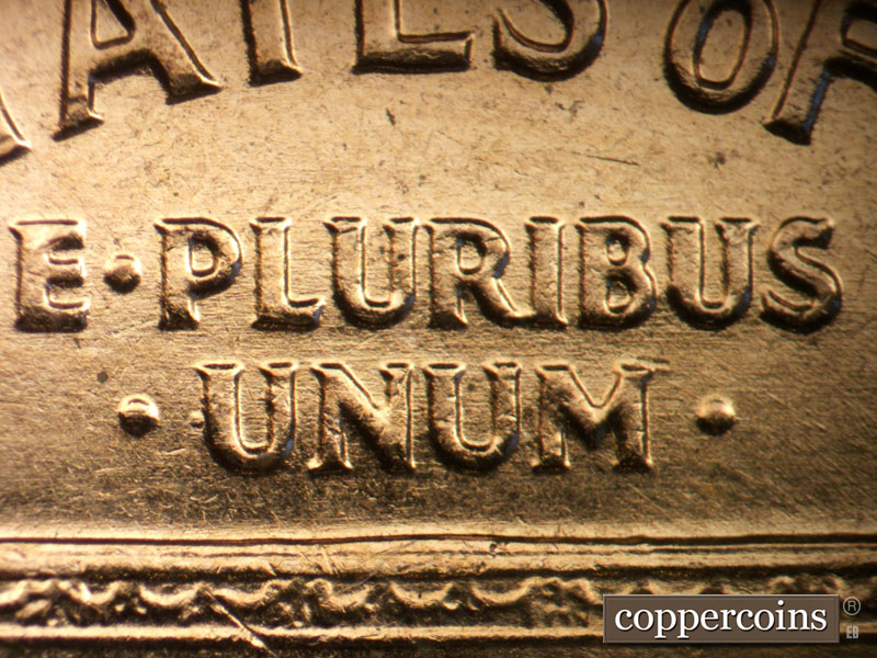Die-stage B marker on 1960D•1MM•022 showing Die scratches between letters in PLURIBUS and one above on the IBU.