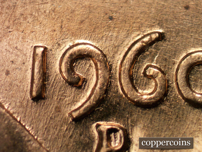 Die-stage B marker on 1960D•1MM•029 showing SSW die scratches through date.