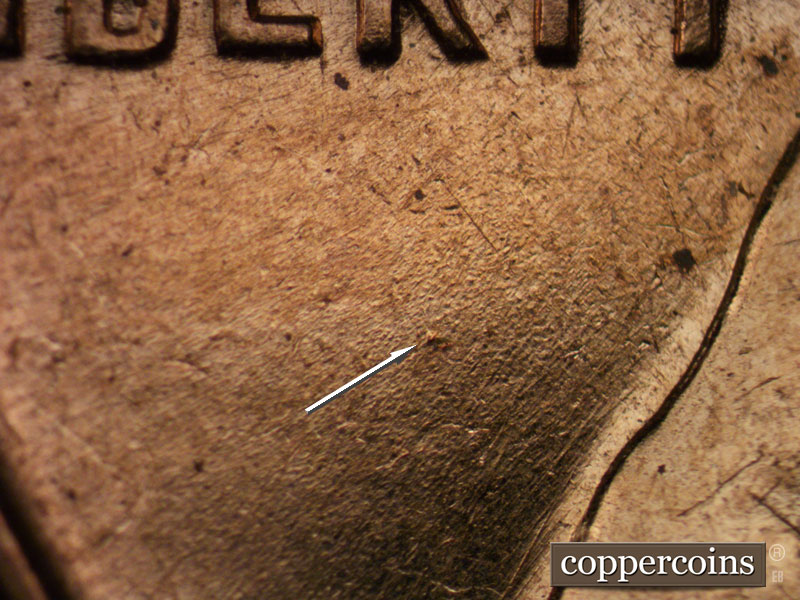 Die-stage B marker on 1960D•1MM•029 showing Die dot under R in LIBERTY.