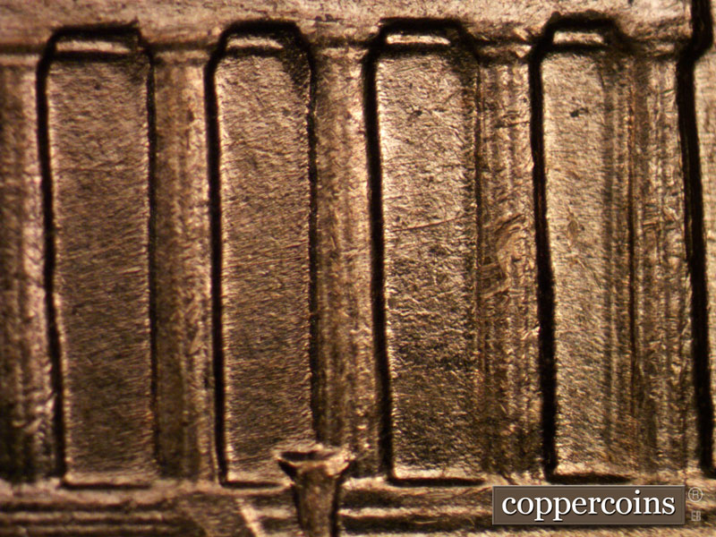 Die-stage B marker on 1960D•1MM•029 showing E/W die scratch in middle bay 10.