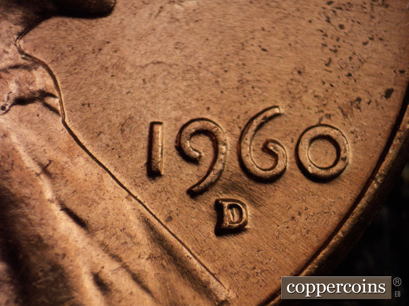 Die-stage C marker on 1960D•1MM•029 showing Generally NNE die scratches through date.