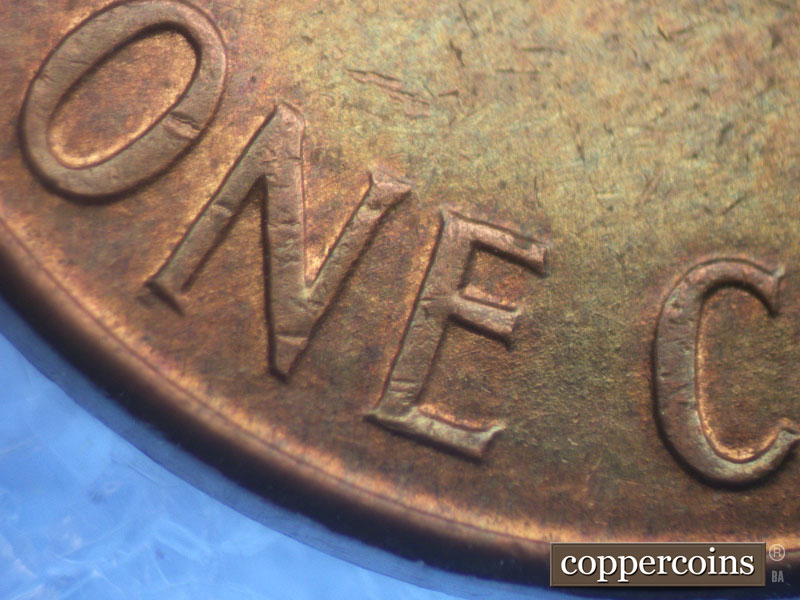 Die-stage A marker on 1960D•1MM•030 showing Light die scratches through ONE CENT.