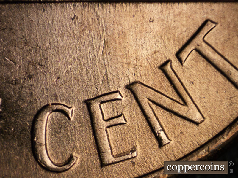 Die-stage B marker on 1960D•1MM•030 showing Generally n?S die scratches through CENT.