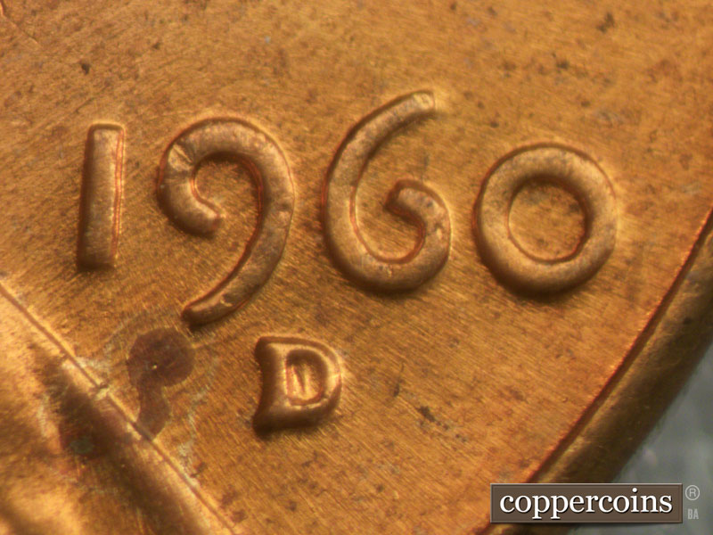 Die-stage B marker on 1960D•1MM•032 showing Curved die scratch under 9 in date.