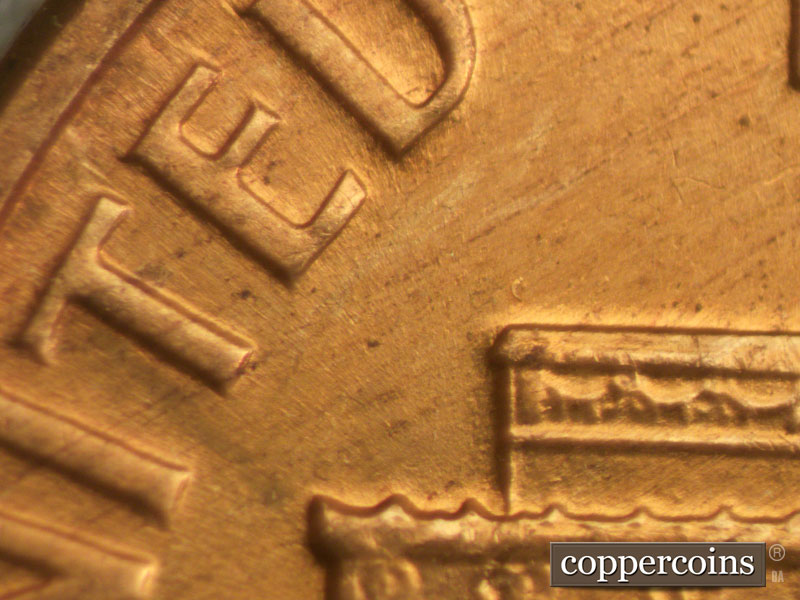 Die-stage B marker on 1960D•1MM•032 showing No die die scratches off E of UNITED.