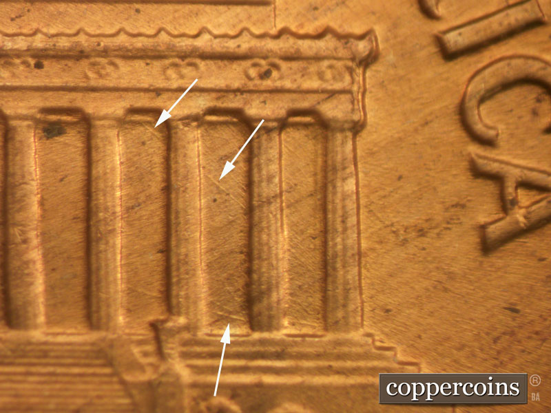 Die-stage B marker on 1960D•1MM•032 showing Diagonal die scratches through bays 10-12.