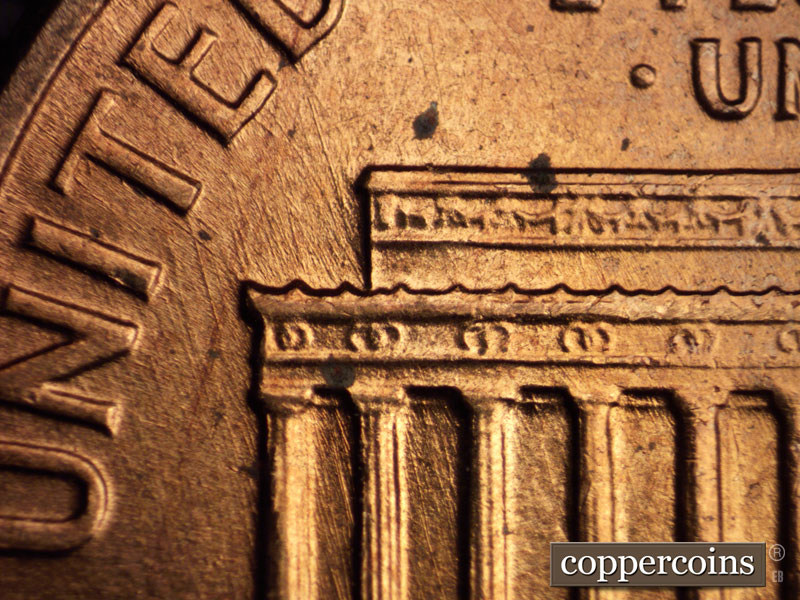 Die-stage C marker on 1960D•1MM•032 showing NNW die scratches through bay 1 and 2.