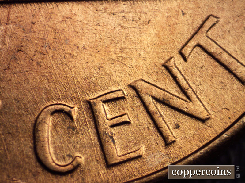 Die-stage C marker on 1960D•1MM•032 showing SSE die scratches through C in CENT.