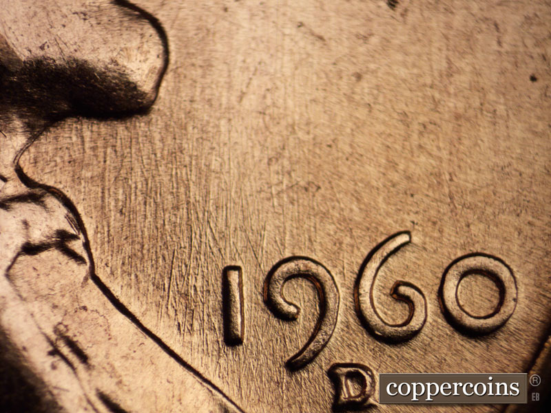 Die-stage C marker on 1960D•1MM•033 showing Heavy N/S die scratches through 19 in date.