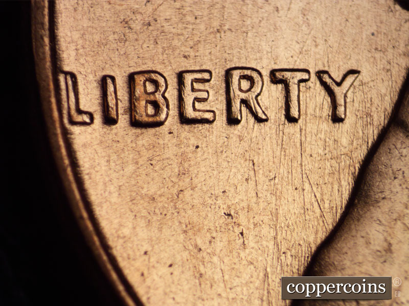Die-stage C marker on 1960D•1MM•033 showing Die scratches through TY in LIBERTY.