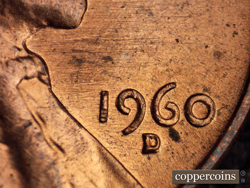 Die-stage B marker on 1960D•1MM•036 showing E/W die scratching through date.
