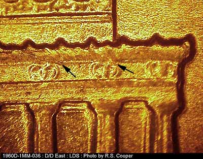 Die-stage C marker on 1960D•1MM•036 showing Die scratches on cornice.