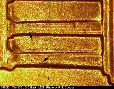 Die-stage C marker on 1960D•1MM•036 showing Die chips on the upper columns 1 and 2.