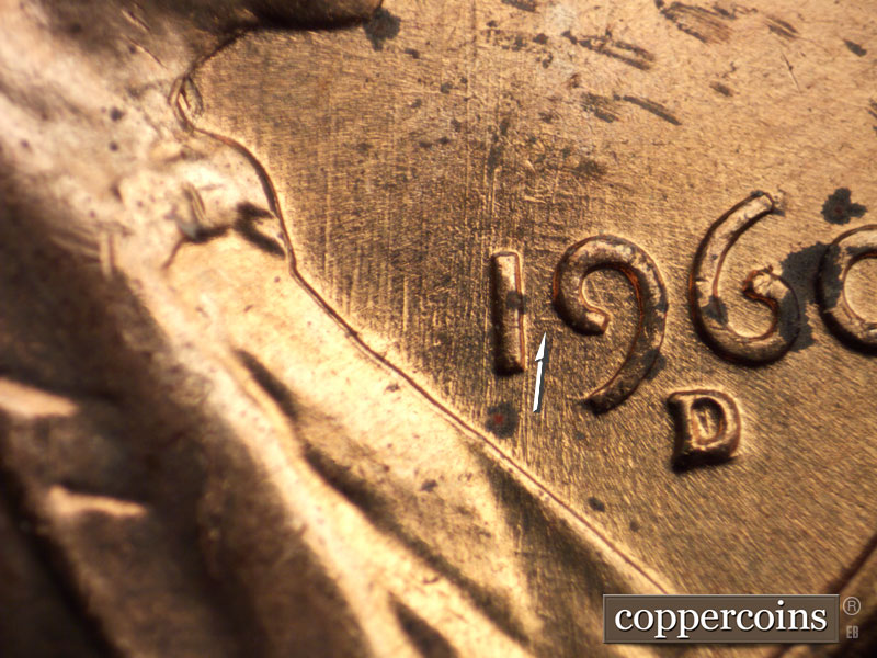 Die-stage B marker on 1960D•1MM•037 showing Numerous die scratches run N-S on the obverse including those through the 1 and 9 of the date.