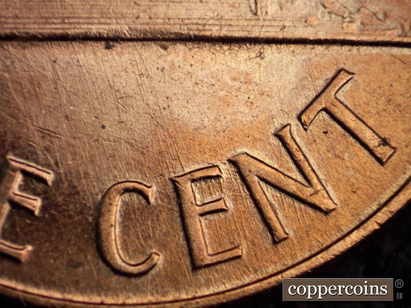 Die-stage B marker on 1960D•1MM•037 showing SSE die scratches throgh CENT.