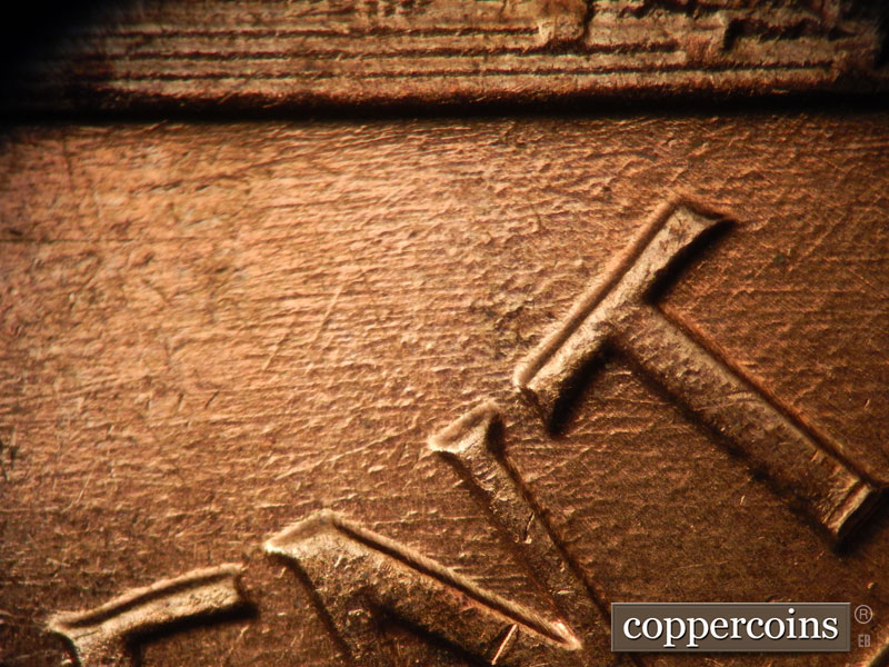 Die-stage B marker on 1960D•1MM•038 showing Multidirectional die scratches above CENT.