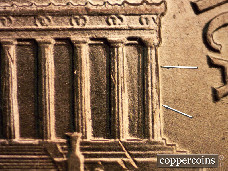 Die-stage B marker on 1960D•1MM•039 showing A die crack on column 12.