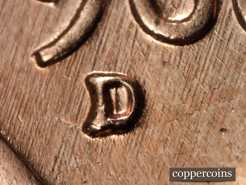 Die-stage C marker on 1960D•1MM•040 showing Closeup of repunched mint mark. SW die scratches through date.