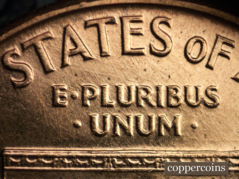 Die-stage B marker on 1960D•1MM•042 showing ESE die scratch from A in STATES to R in PLURIBUS.